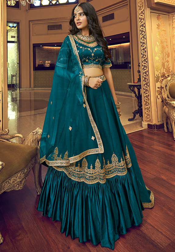 Stunning peacock blue color designer lehenga and gold sequence blouse with  ice blue color net dupatta.F… | Indian gowns dresses, Lehnga dress, Indian  bridal outfits